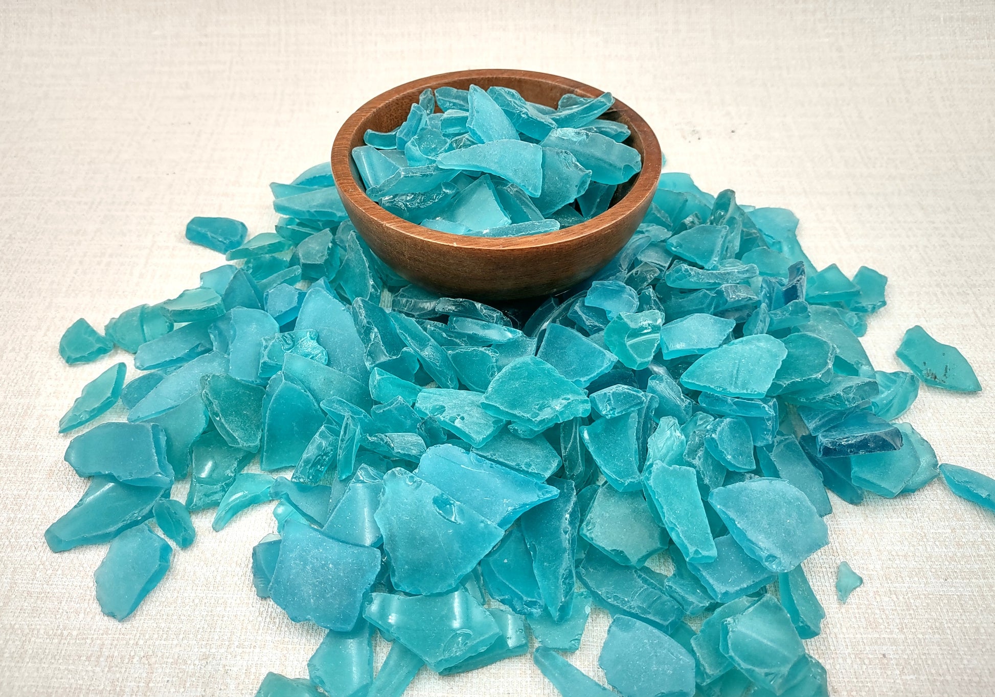 Beach Sea Glass Rough Ocean Blue Frosted (approx. 1 kilogram 0.5-1+ inches) Man made tumbled frosted sea glass fragments. Copyright 2024 Seashellsupply.com