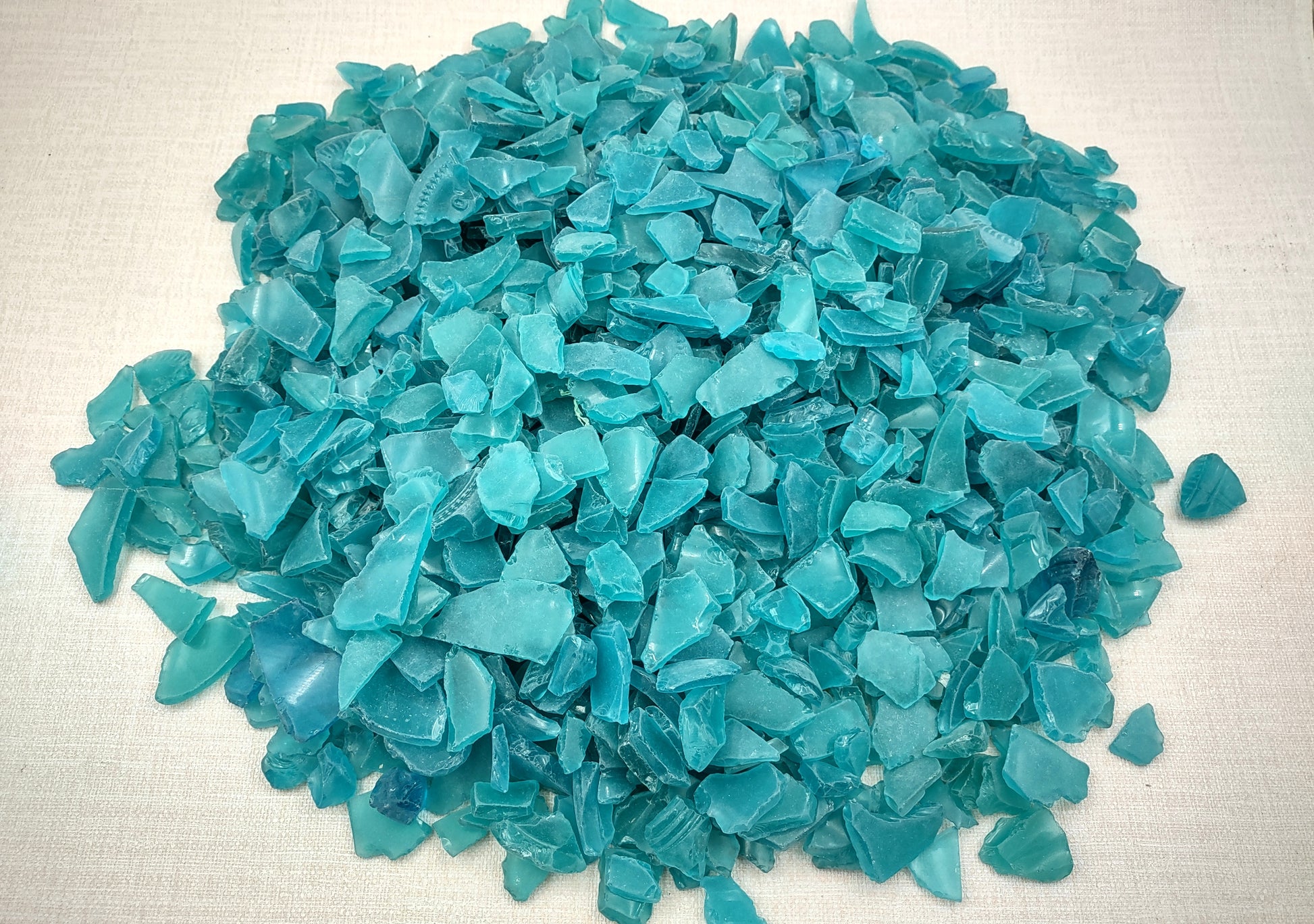 Beach Sea Glass Rough Ocean Blue Medium Tumbled (approx. 10 pounds 0.5-1+ inches Man made tumbled rough sea glass fragments. Copyright 2024 SeashellSupply.com