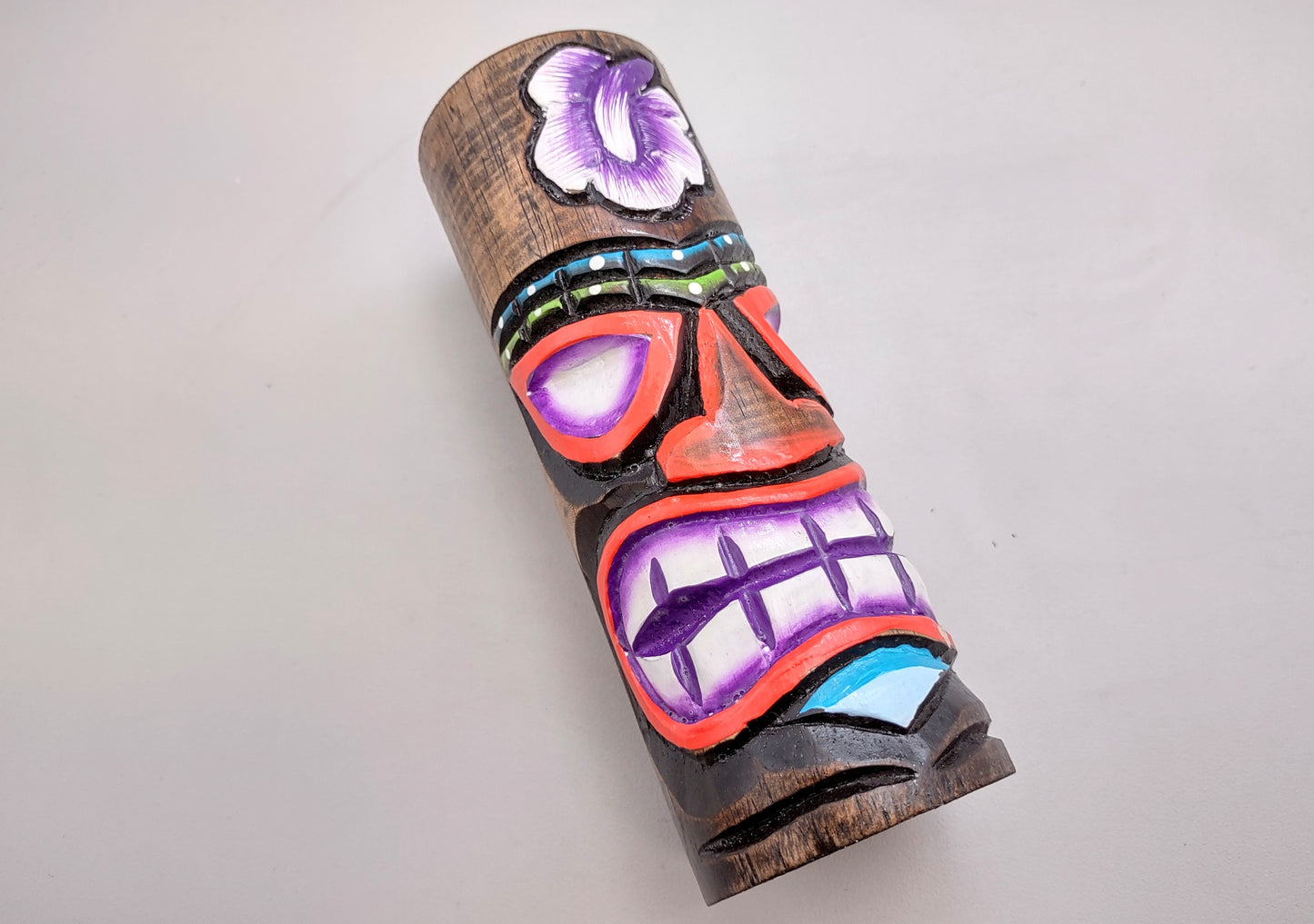 Painted Wooden Tiki Totem Purple And Red (1 pole approx. 6 inches tall) A fun unique touch of colorful Island table décor!