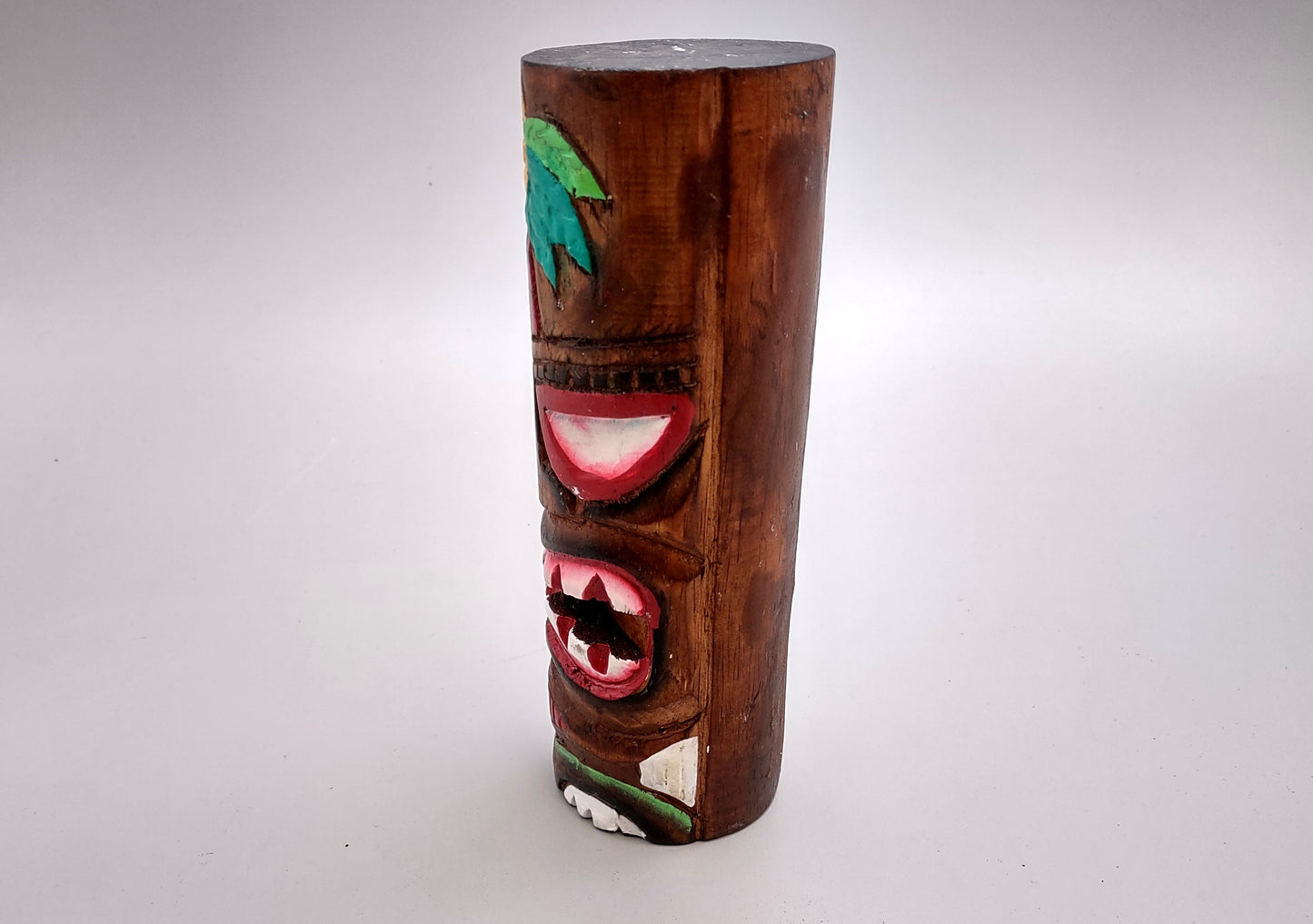 Painted Wooden Palm Frond Tiki Totem (1 figure approx. 8 inches tall) A fun and unique touch of colorful Island décor!