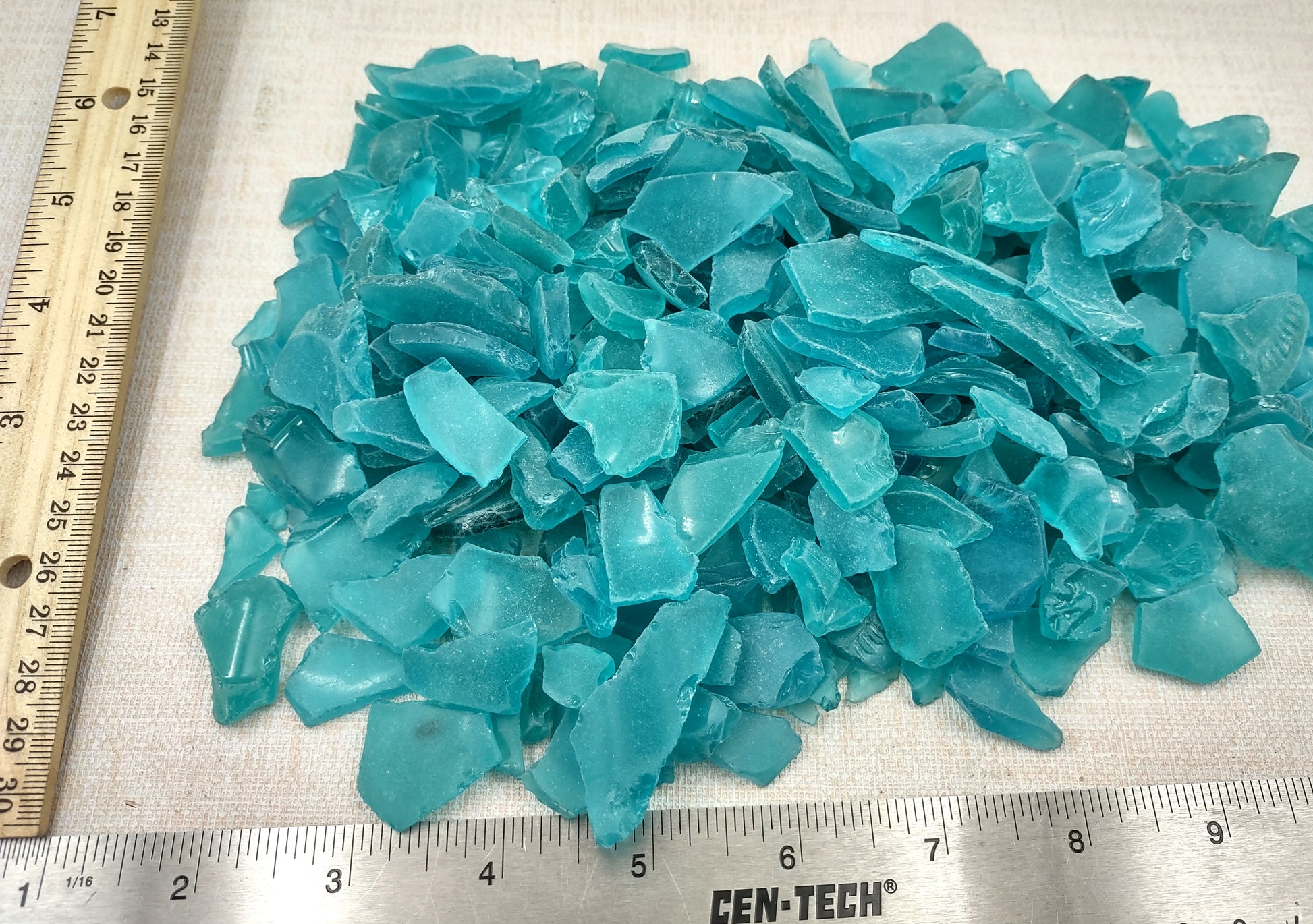 Beach Sea Glass Rough Ocean Blue Frosted (approx. 1 kilogram 0.5-1+ inches) Man made tumbled frosted sea glass fragments. Copyright 2024 Seashellsupply.com