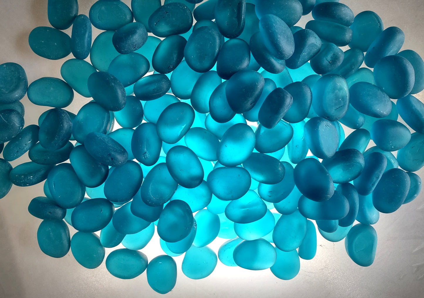 Beach Sea Glass Rounded Ocean Blue Tumbled Pebbles (approx. 10 pounds 1+ inch) Copyright 2024 SeaShellSupply.com