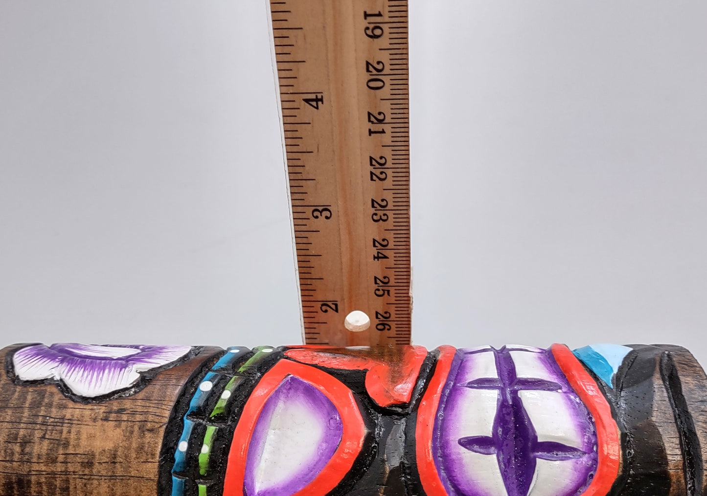 Painted Wooden Tiki Totem Purple And Red (1 pole approx. 6 inches tall) A fun unique touch of colorful Island table décor!