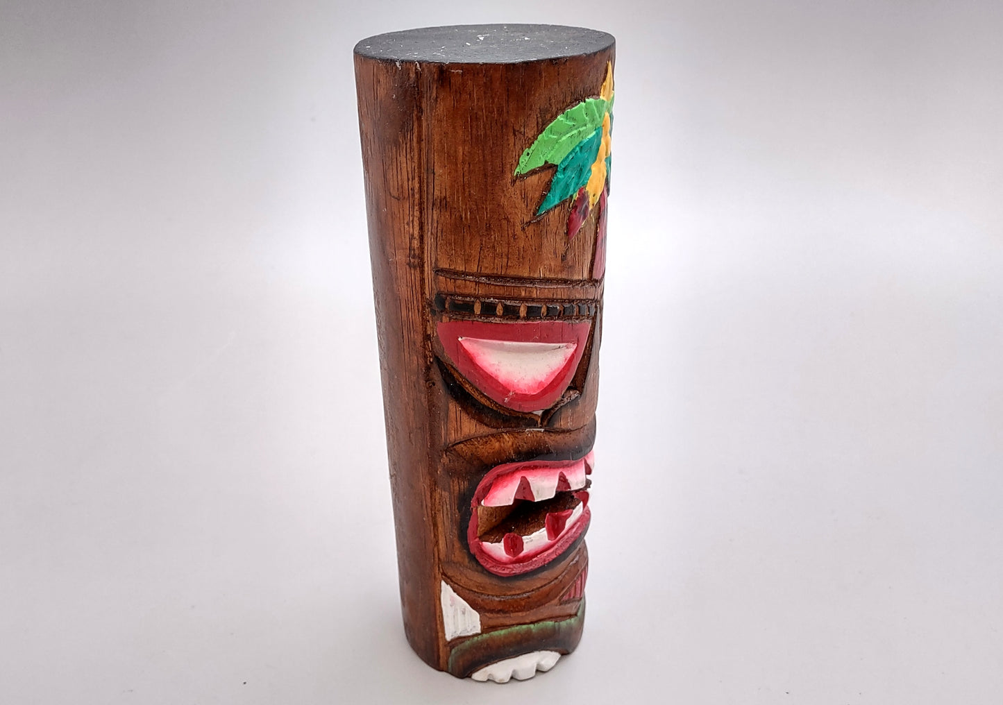 Painted Wooden Palm Frond Tiki Totem (1 figure approx. 8 inches tall) A fun and unique touch of colorful Island décor!