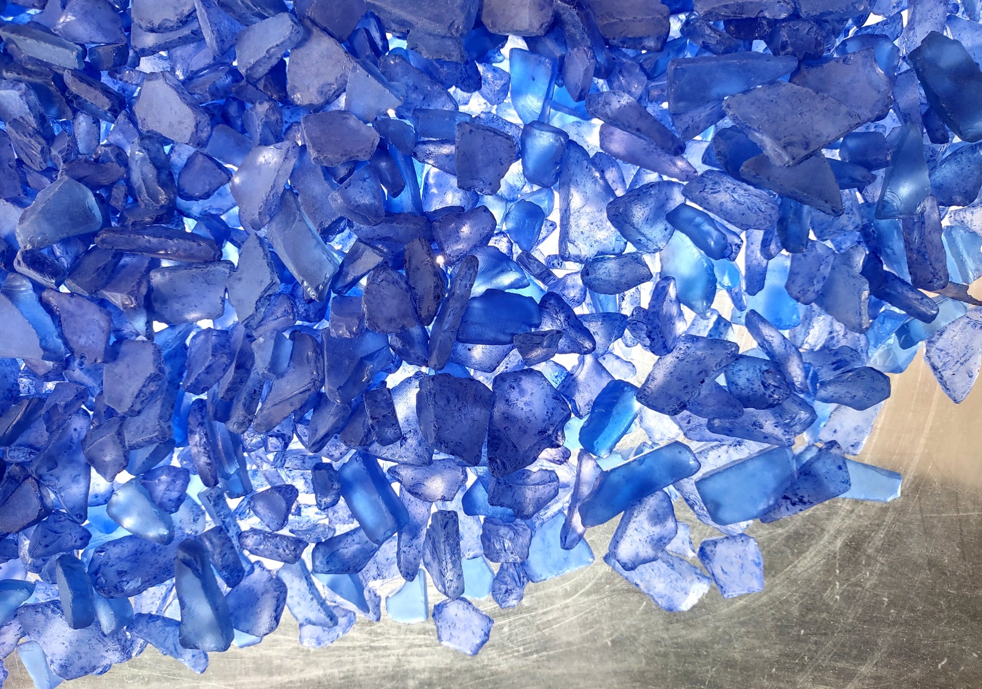 Beach Sea Glass Rough Deep Blue Medium Tumbled (approx. 10 pounds 0.5-1+ inches) Man-made tumbled rough sea glass fragments! Bright blue different-shaped sea glass. Copyright 2024 SeaShellMart.com