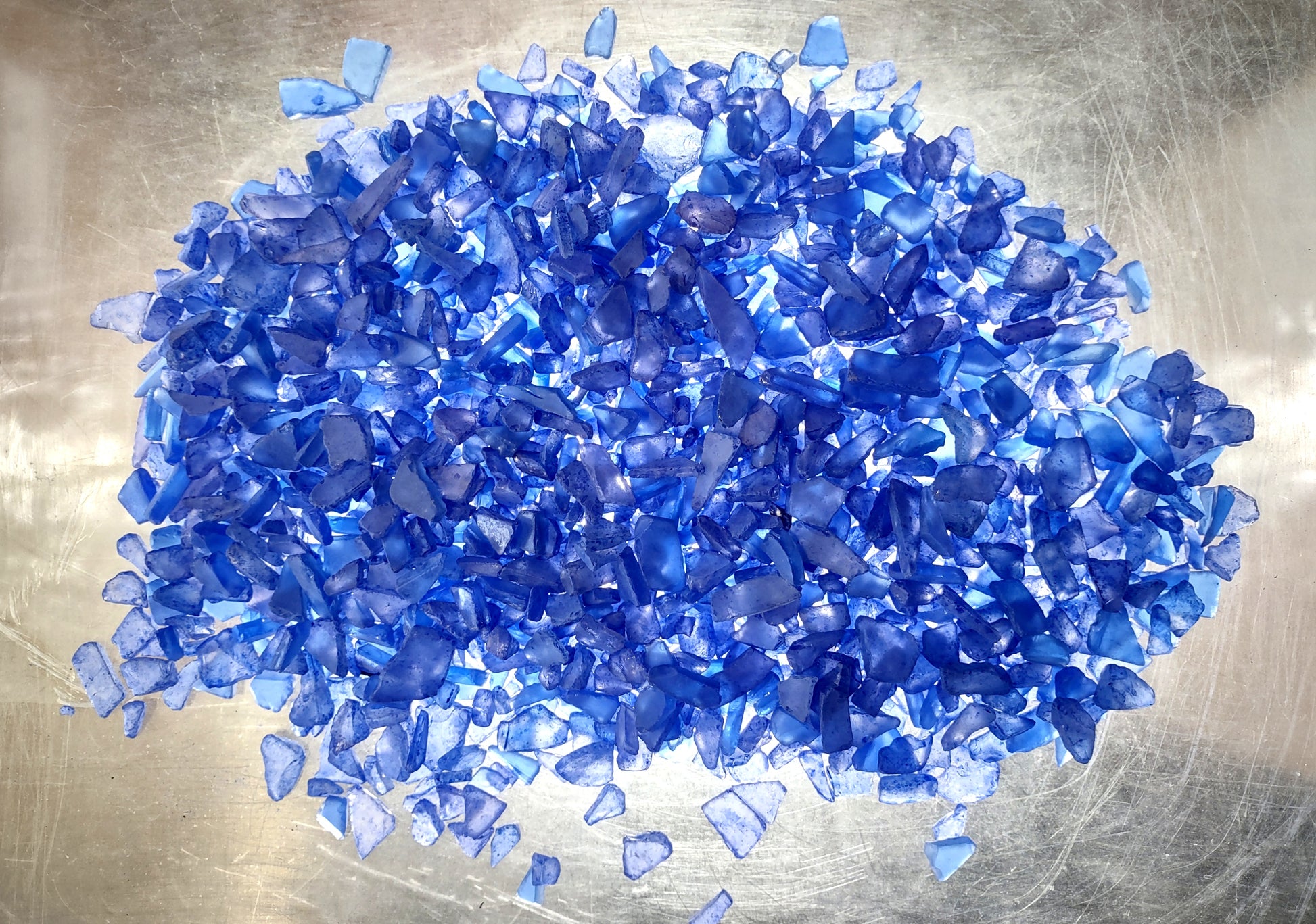 Beach Sea Glass Rough Deep Blue Medium Tumbled (approx. 1 kilogram 0.5-1+ inches) Man made tumbled sea glass! Ombre blue chips, perfect for vase decorating and mosaic tile making. Copyright 2024 SeaShellSupply.com