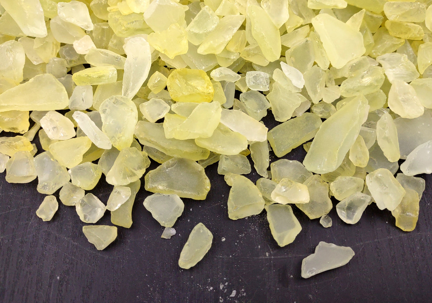 Beach Sea Glass Rough Yellow Green Medium (approx. 10 pounds 0.5-1+ inches) Man made tumbled sea glass fragments. Copyright 2024 SeashellSupply.com