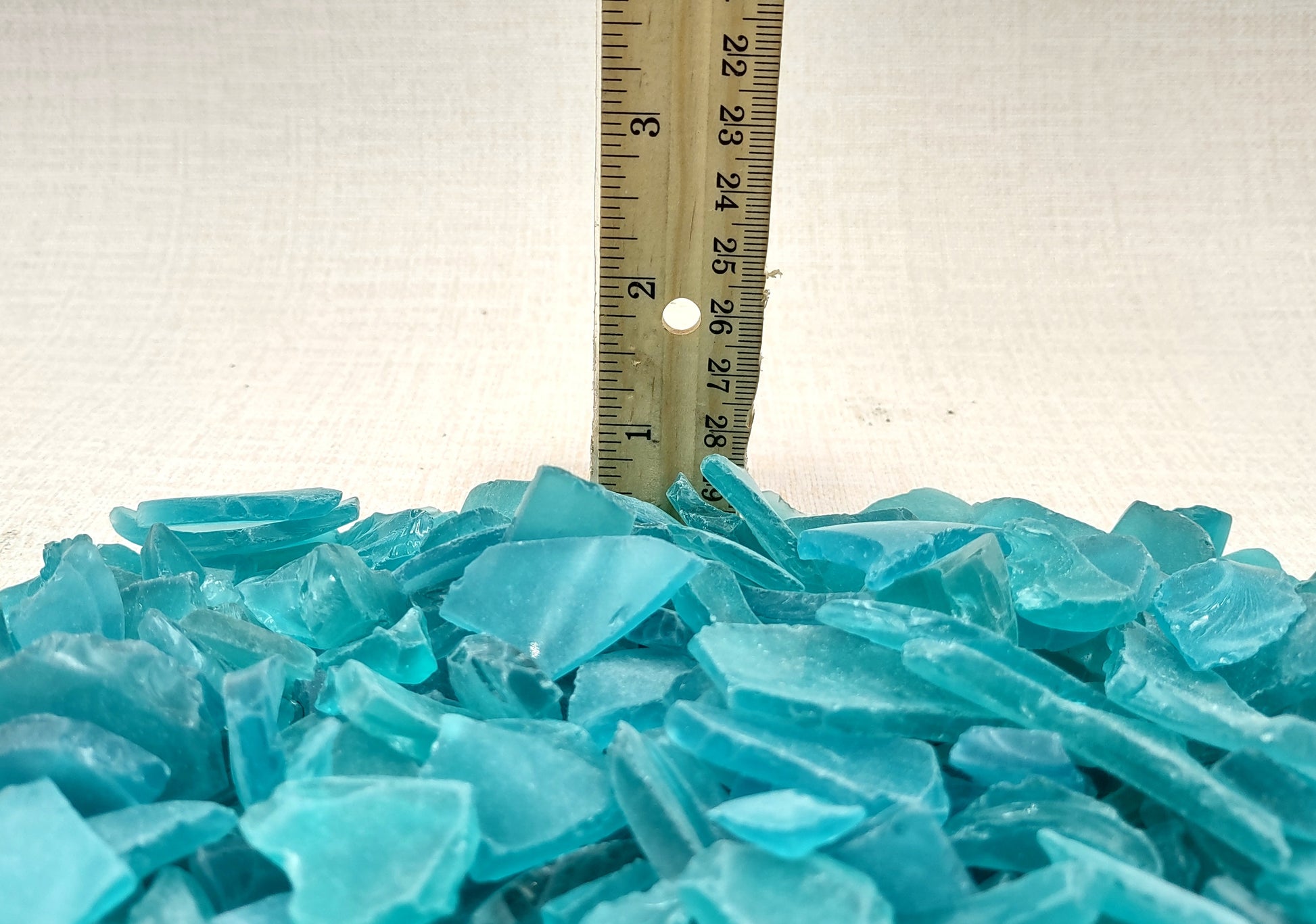 Beach Sea Glass Rough Ocean Blue Frosted (approx. 1 kilogram 0.5-1+ inches) Man made tumbled frosted sea glass fragments. Copyright 2024 Seashellsupply.com