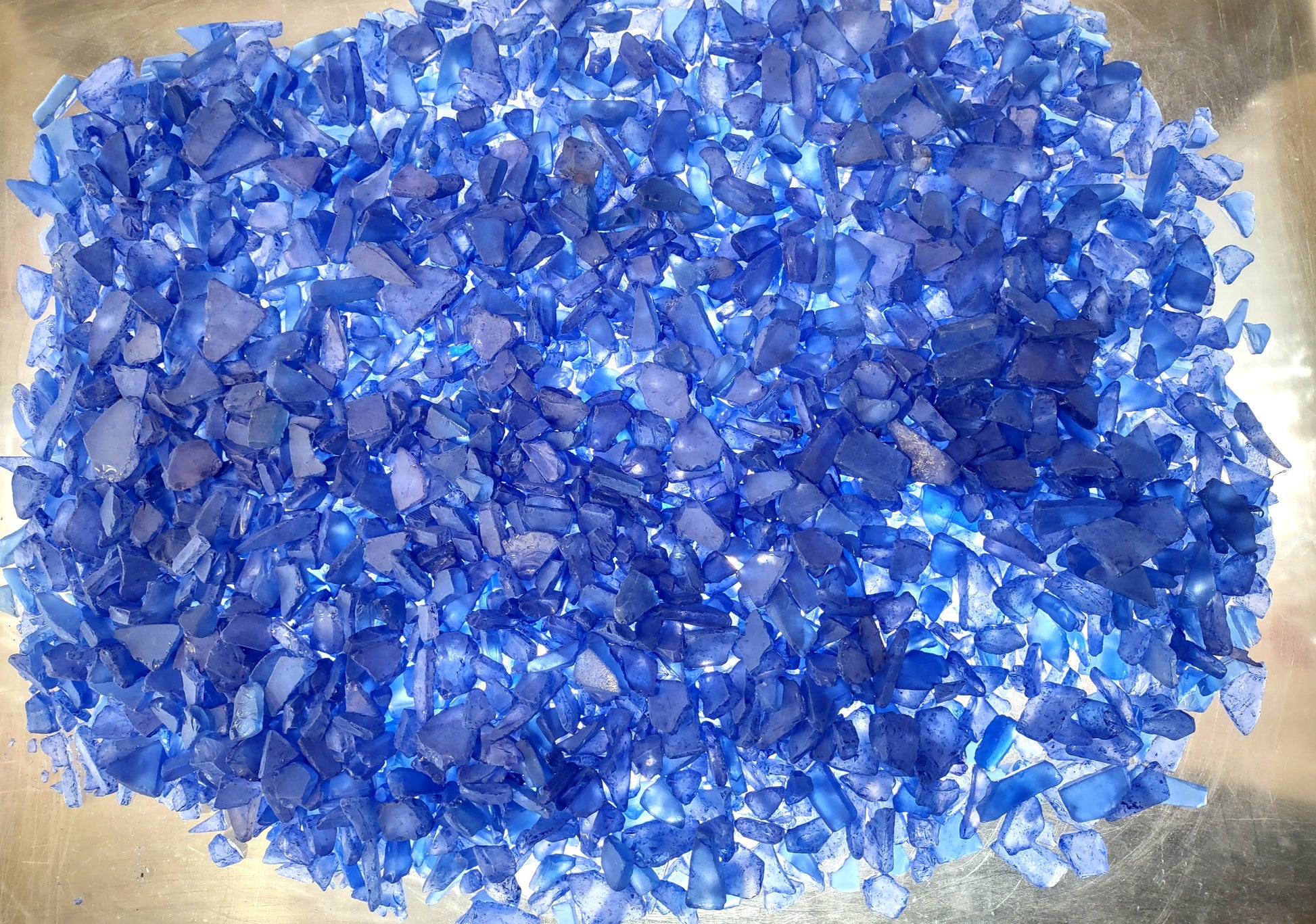 Beach Sea Glass Rough Deep Blue Medium Tumbled (approx. 10 pounds 0.5-1+ inches) Man-made tumbled rough sea glass fragments! Bright blue different-shaped sea glass. Copyright 2024 SeaShellMart.com