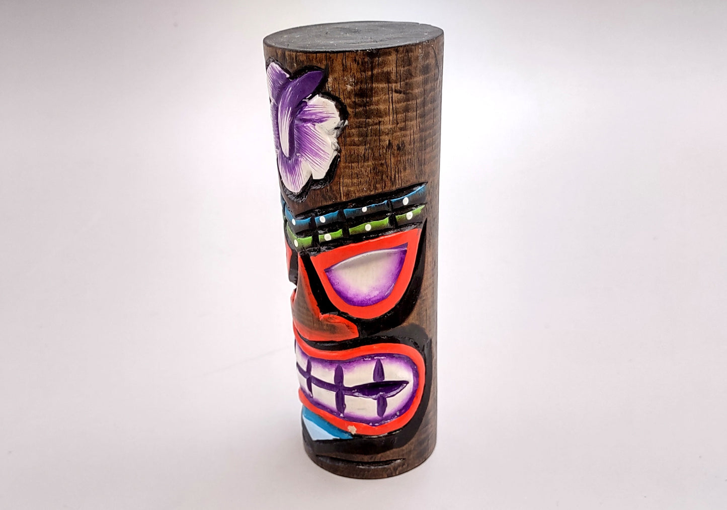 Painted Wooden Tiki Totem Purple And Red (1 pole approx. 6 inches tall) A fun unique touch of colorful Island table décor!