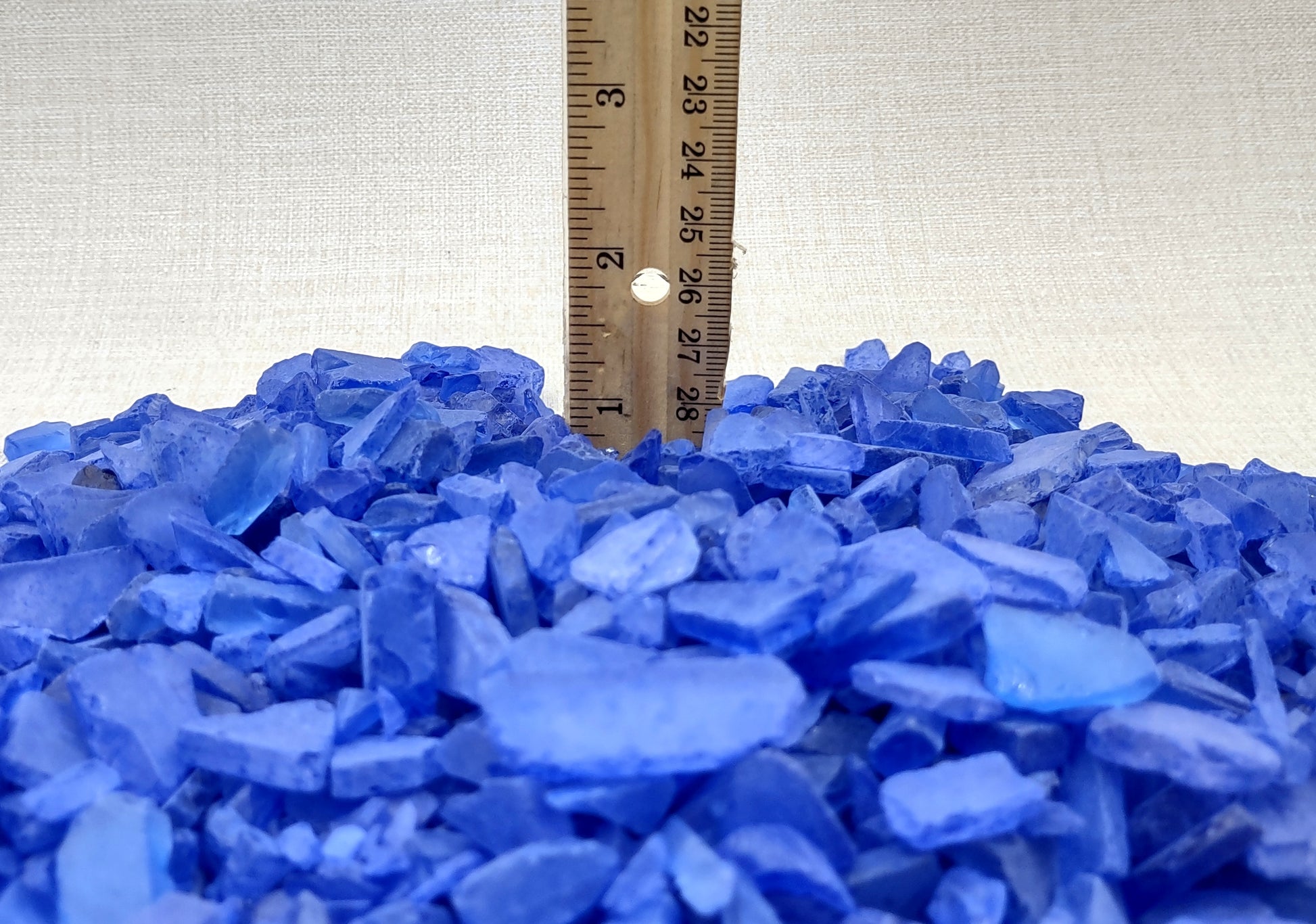 Beach Sea Glass Rough Deep Blue Medium Tumbled (approx. 1 kilogram 0.5-1+ inches) Man made tumbled sea glass! Ombre blue chips, perfect for vase decorating and mosaic tile making. Copyright 2024 SeaShellSupply.com