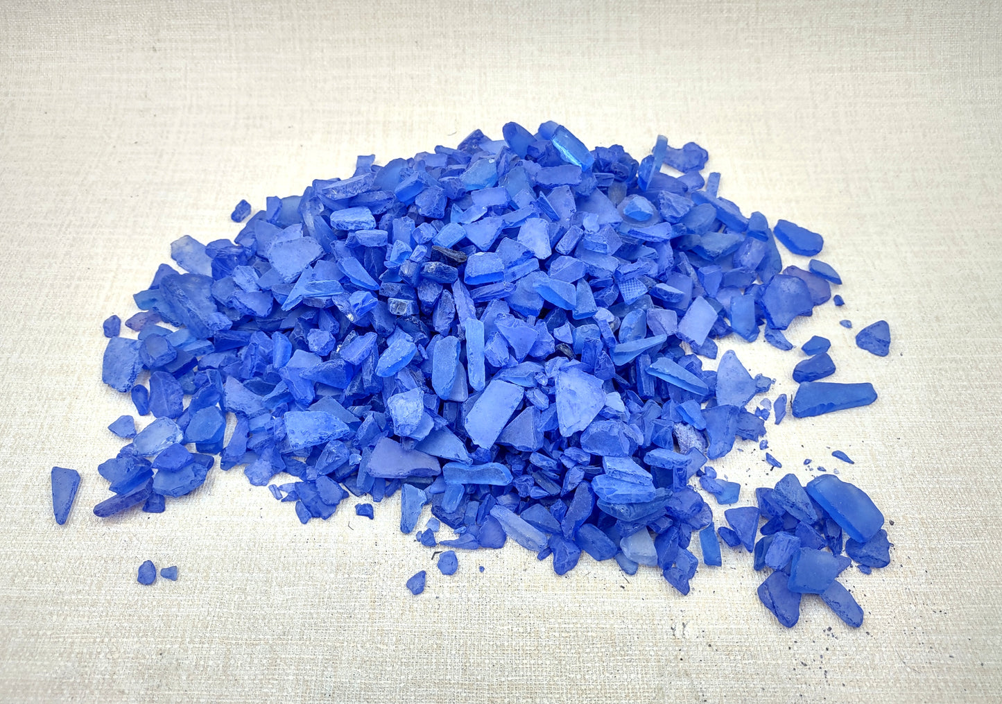 Beach Sea Glass Rough Deep Blue Medium Tumbled (approx. 1 kilogram 0.5-1+ inches) Man made tumbled sea glass! Ombre blue chips, perfect for vase decorating and mosaic tile making. Copyright 2024 SeaShellSupply.com