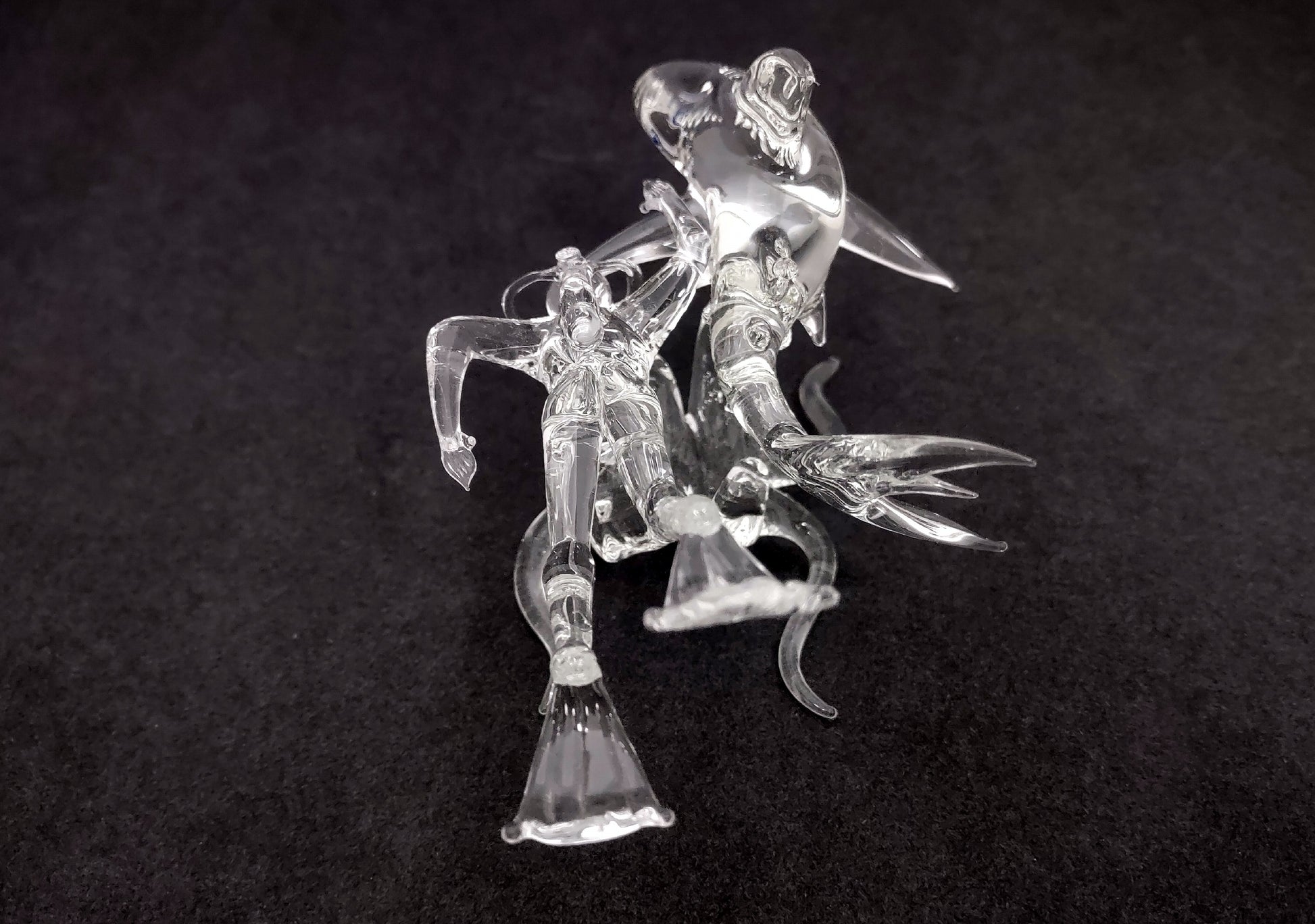 Glass Blown Figurine Shark with Diver - (1 figurine approx. 3X6 inches). figurine glass smooth decoration with supportive base. Copyright 2022 SeaShellSupply.com.