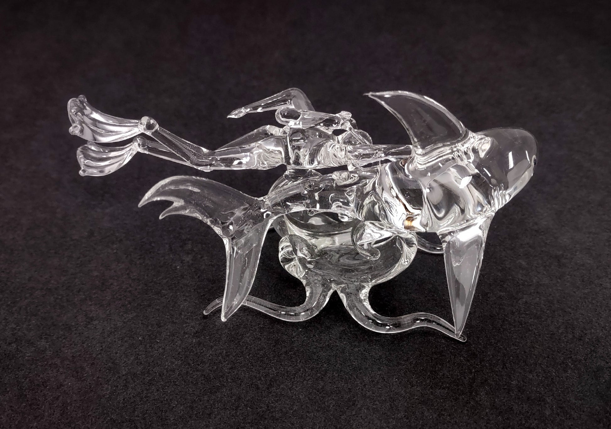 Glass Blown Figurine Shark with Diver - (1 figurine approx. 3X6 inches). figurine glass smooth decoration with supportive base. Copyright 2022 SeaShellSupply.com.